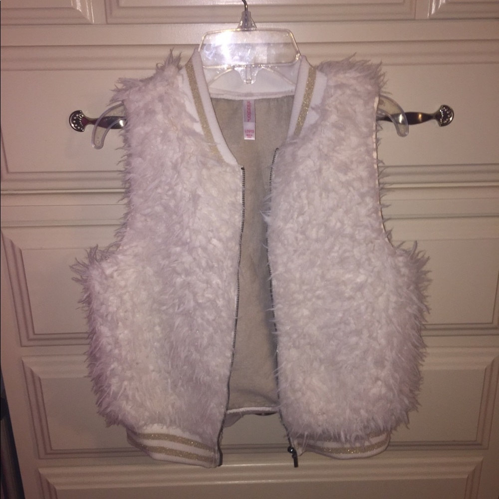 White vest.